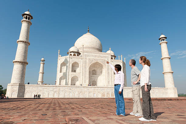 English speaking tour guide in Agra explaining Taj Mahal history